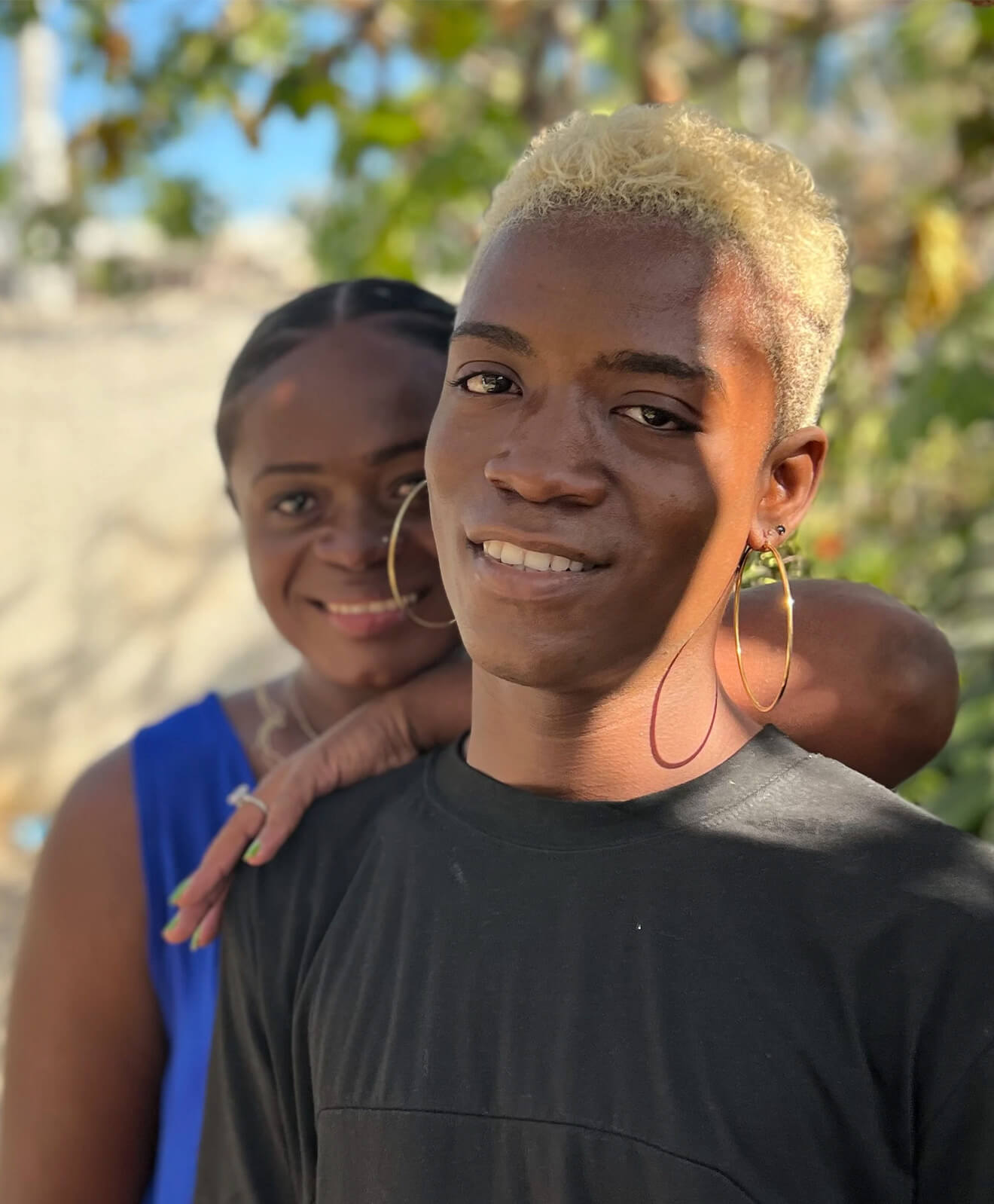 Photo of two Haitian trans people