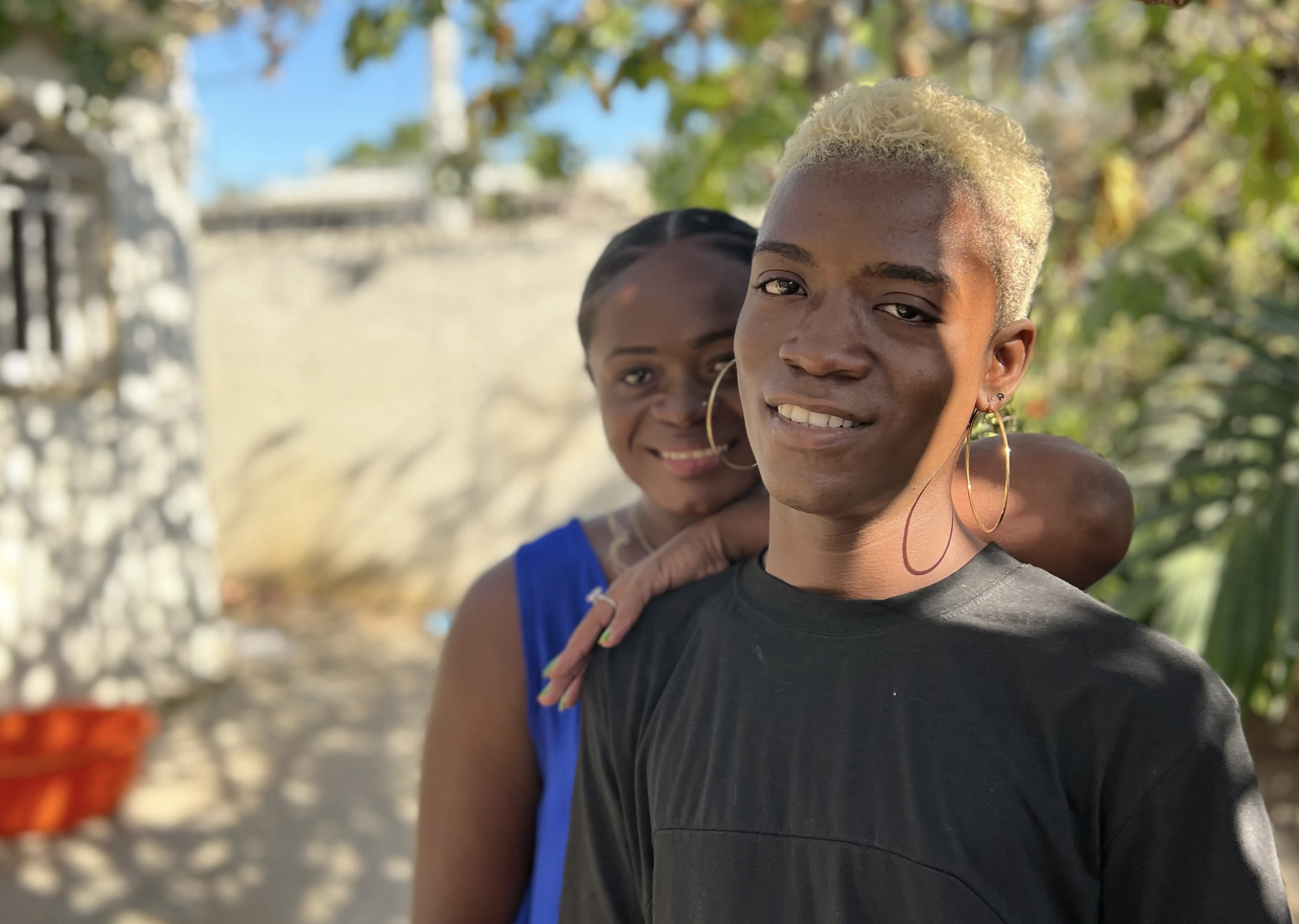 Photo of two Haitian trans people