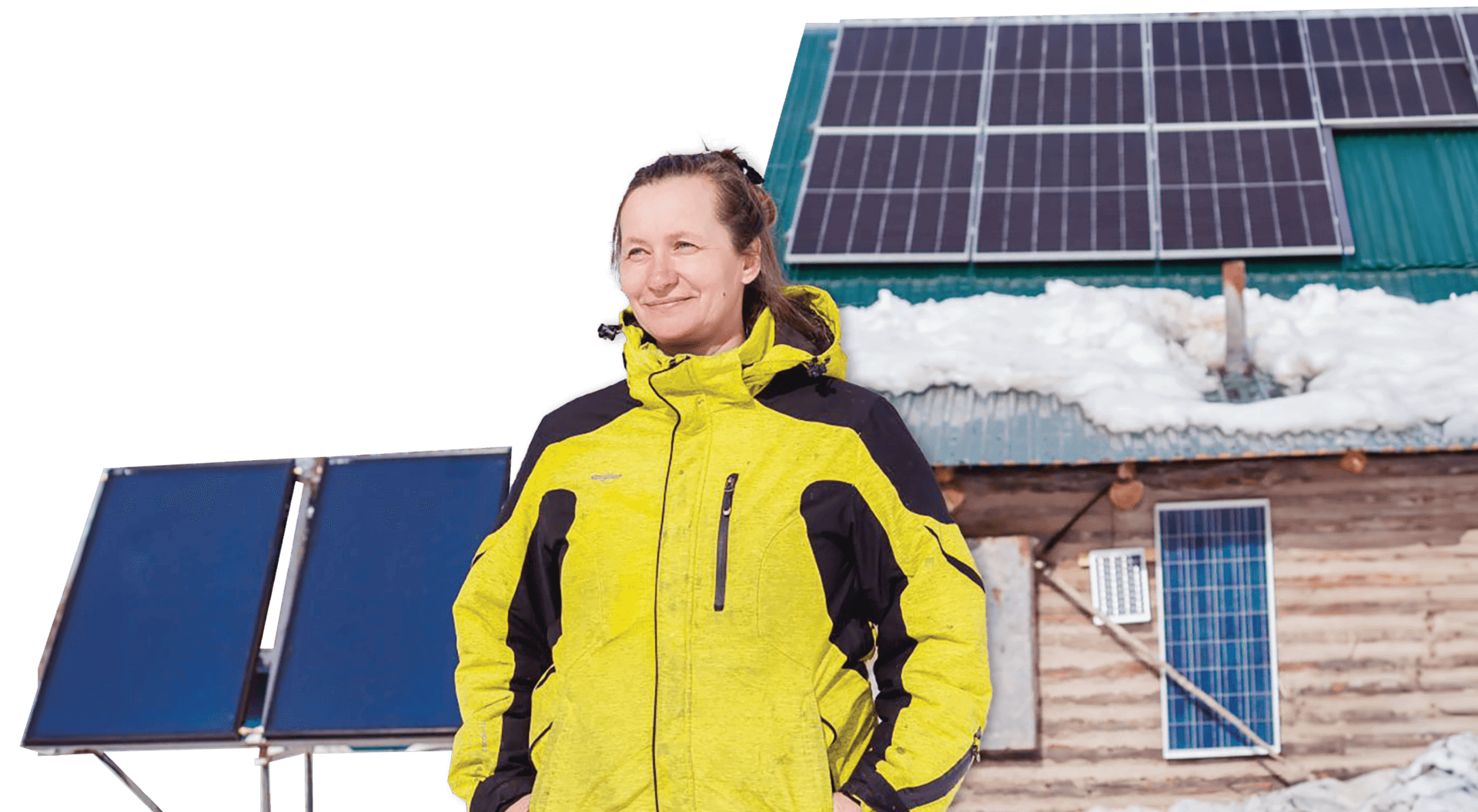 woman in front of house with solar panels